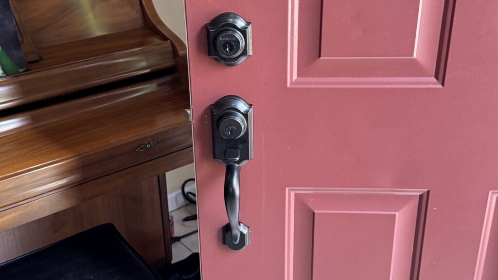New deadbolt and handleset installed on a front door in a Columbus home