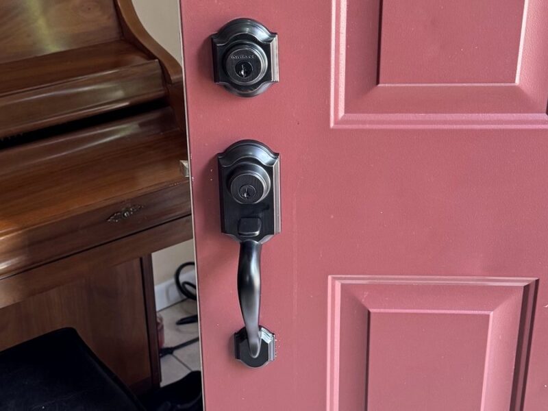 New deadbolt and handleset installed on a front door in a Columbus home