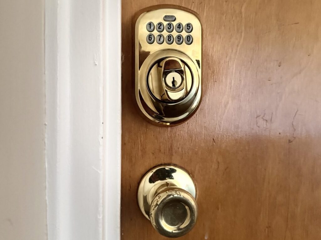 Schlage deadbolt on an apartment door after the tenant lost the key